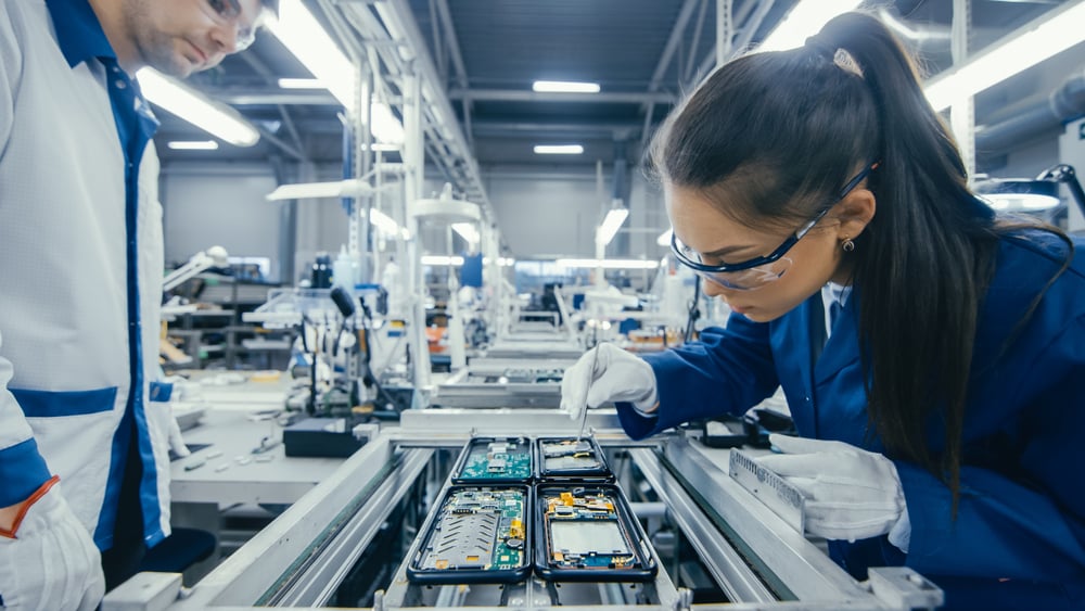 Electronics Factory Workers Assembling Circuit Boards by Hand in Mexico